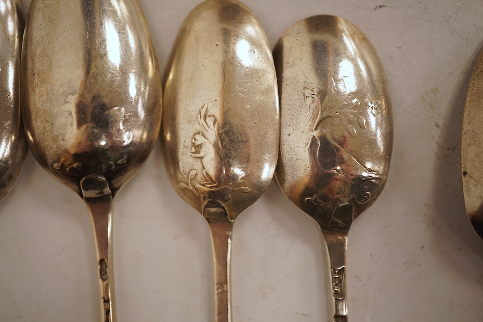 A collection of twenty nine assorted Georgian picture back teaspoons, various dates and makers, including three with masted ship, some marks indistinct, 10.2oz.